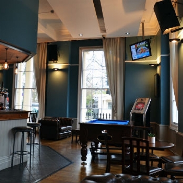 Communal areas include a bar and dining room